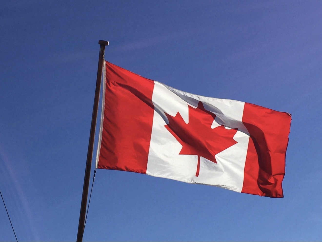 Canada flag symbol of immigration and relocation