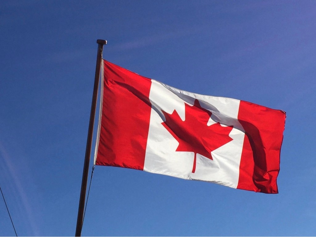 Canada flag symbol of immigration and relocation
