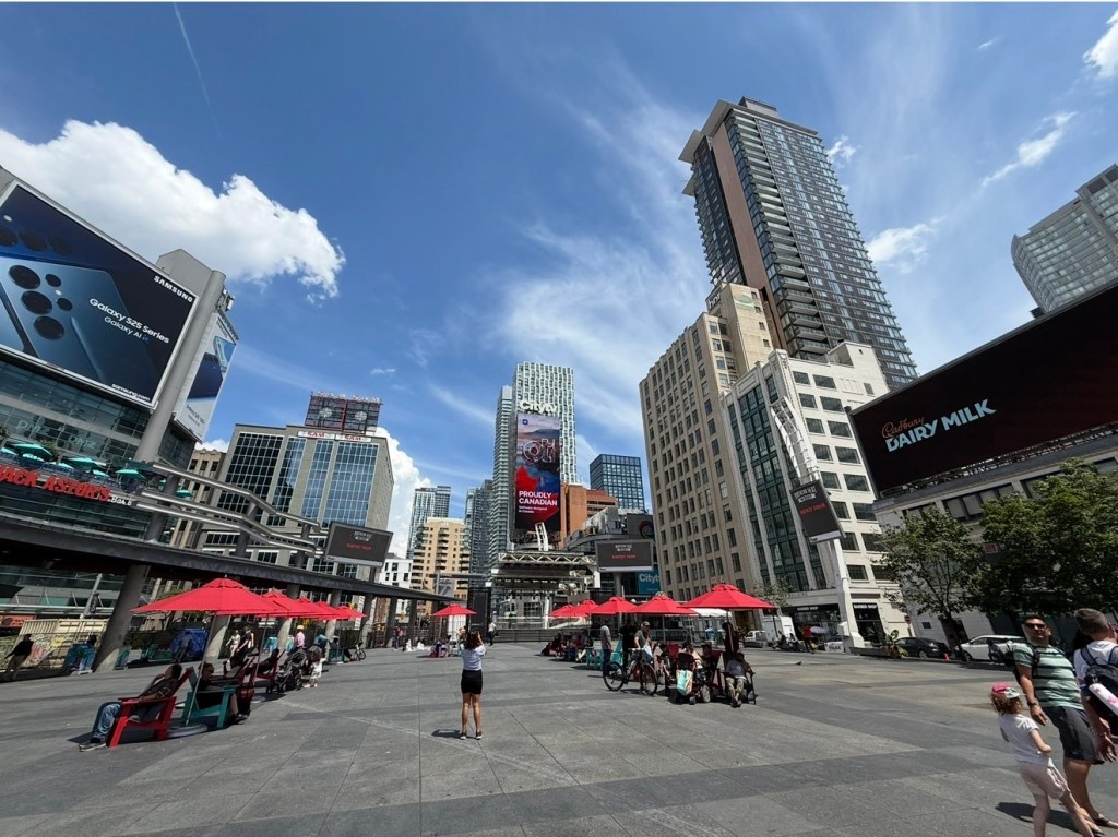 Daily life in downtown Toronto with people and city atmosphere